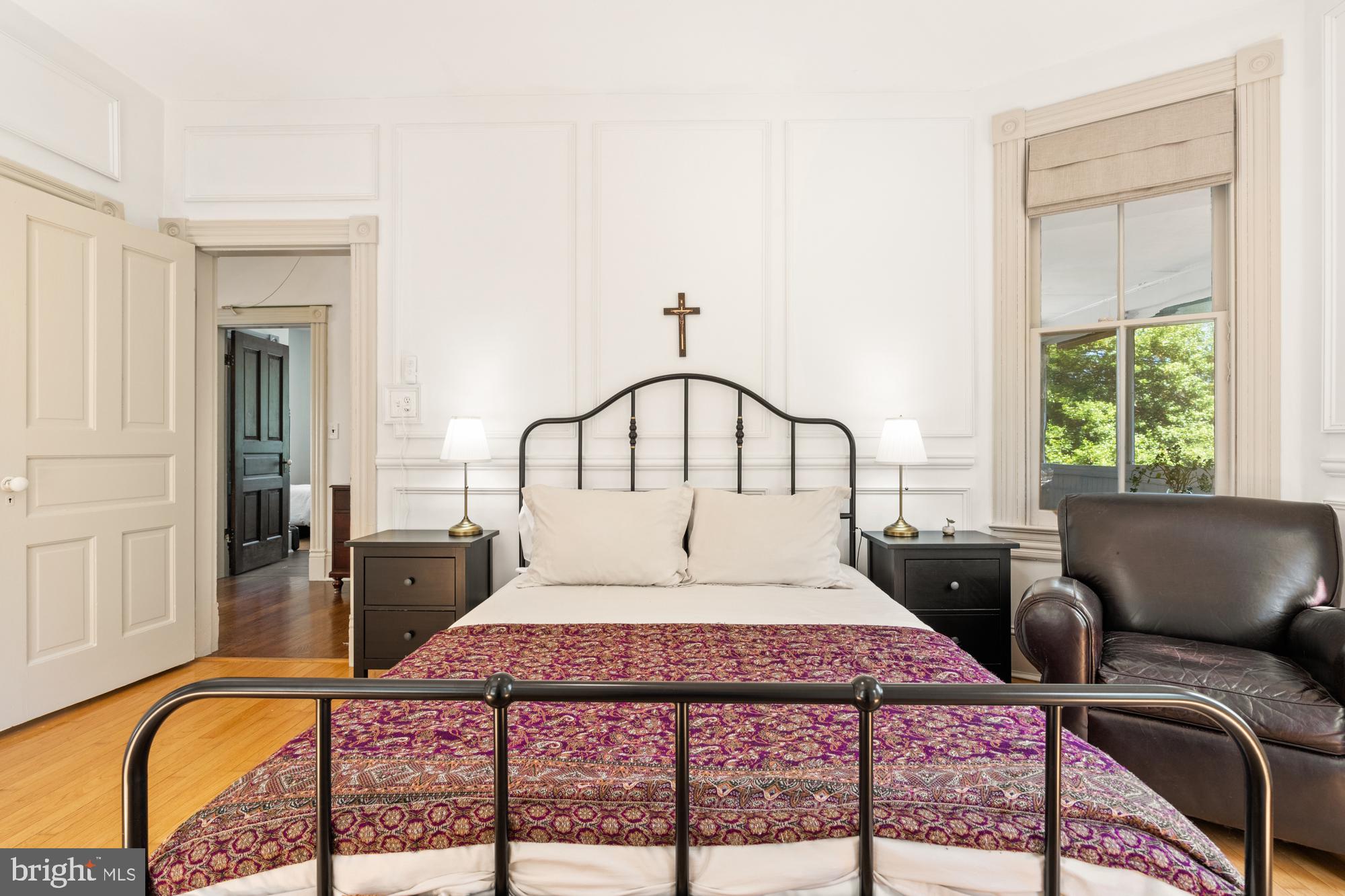 4916 40th Place Hyattsville, MD 20781 - Photo 25 of 48 a bedroom with a bed a couch and dresser