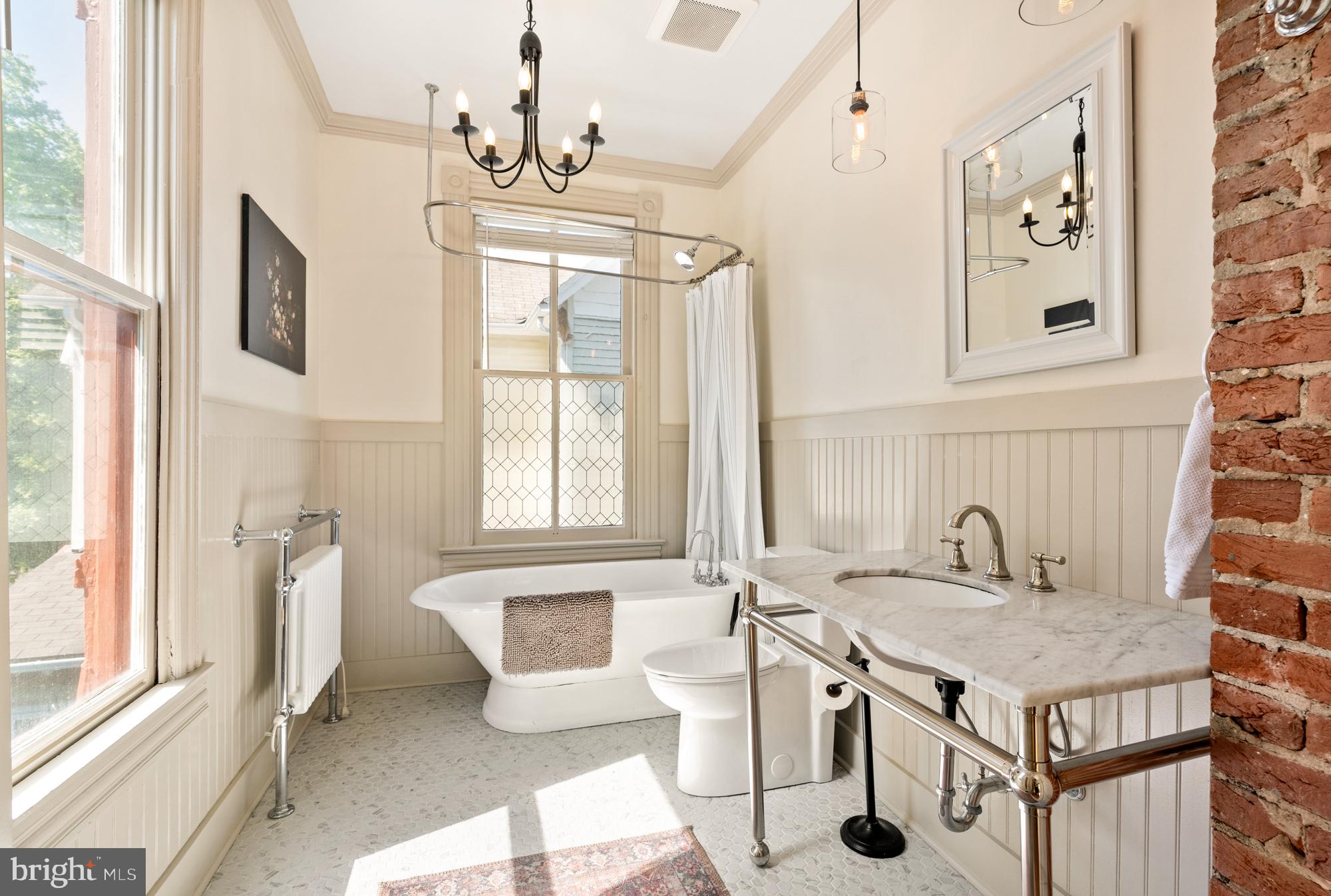 4916 40th Place Hyattsville, MD 20781 - Photo 27 of 48 a view of a kitchen with granite countertop a sink and a stove top oven