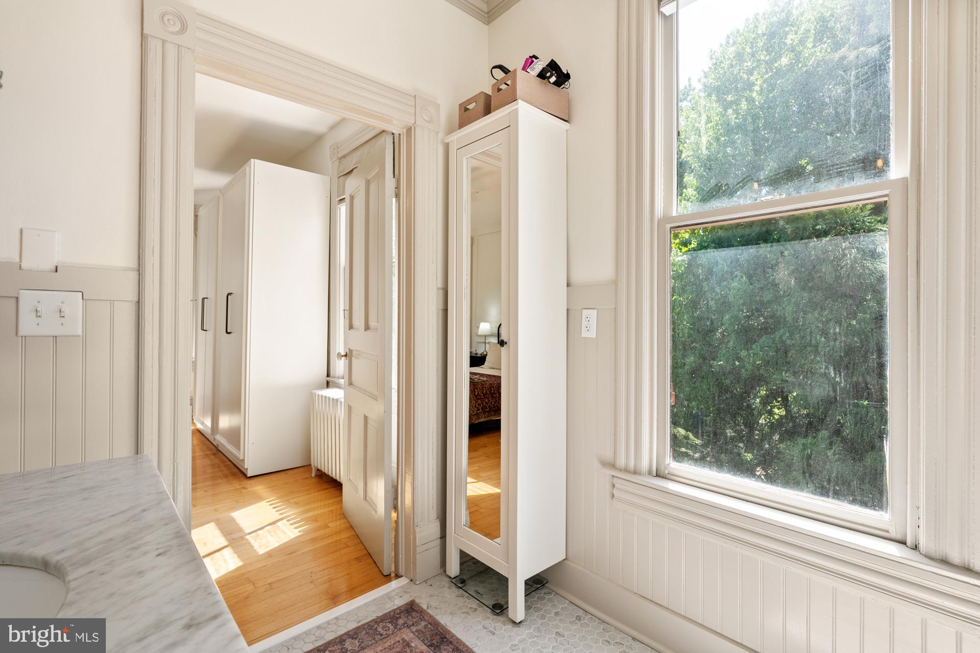 4916 40th Place Hyattsville, MD 20781 - Photo 28 of 48 a view of a bathroom with a glass door