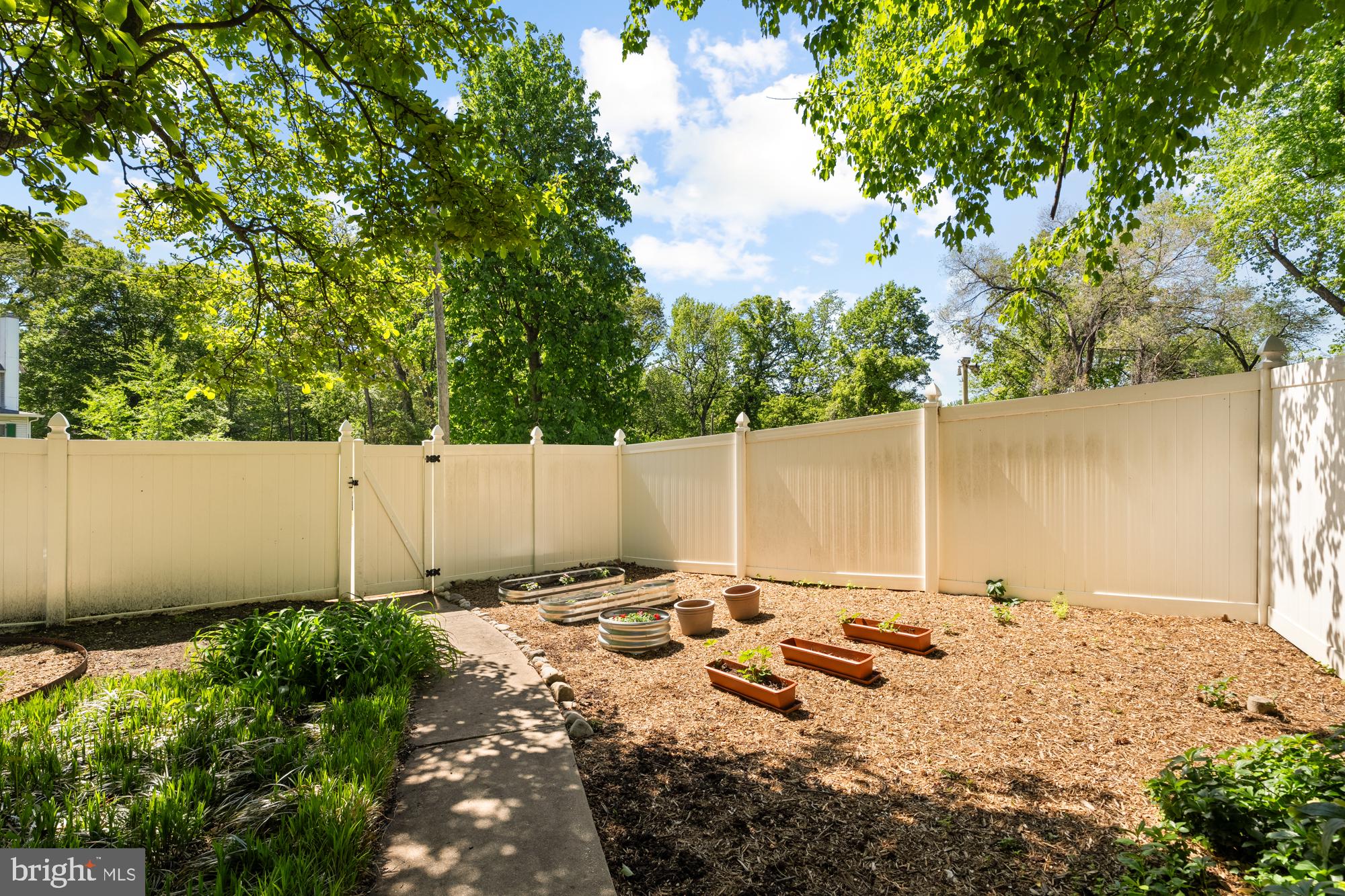 4916 40th Place Hyattsville, MD 20781 - Photo 45 of 48 a backyard of a house with lots of green space