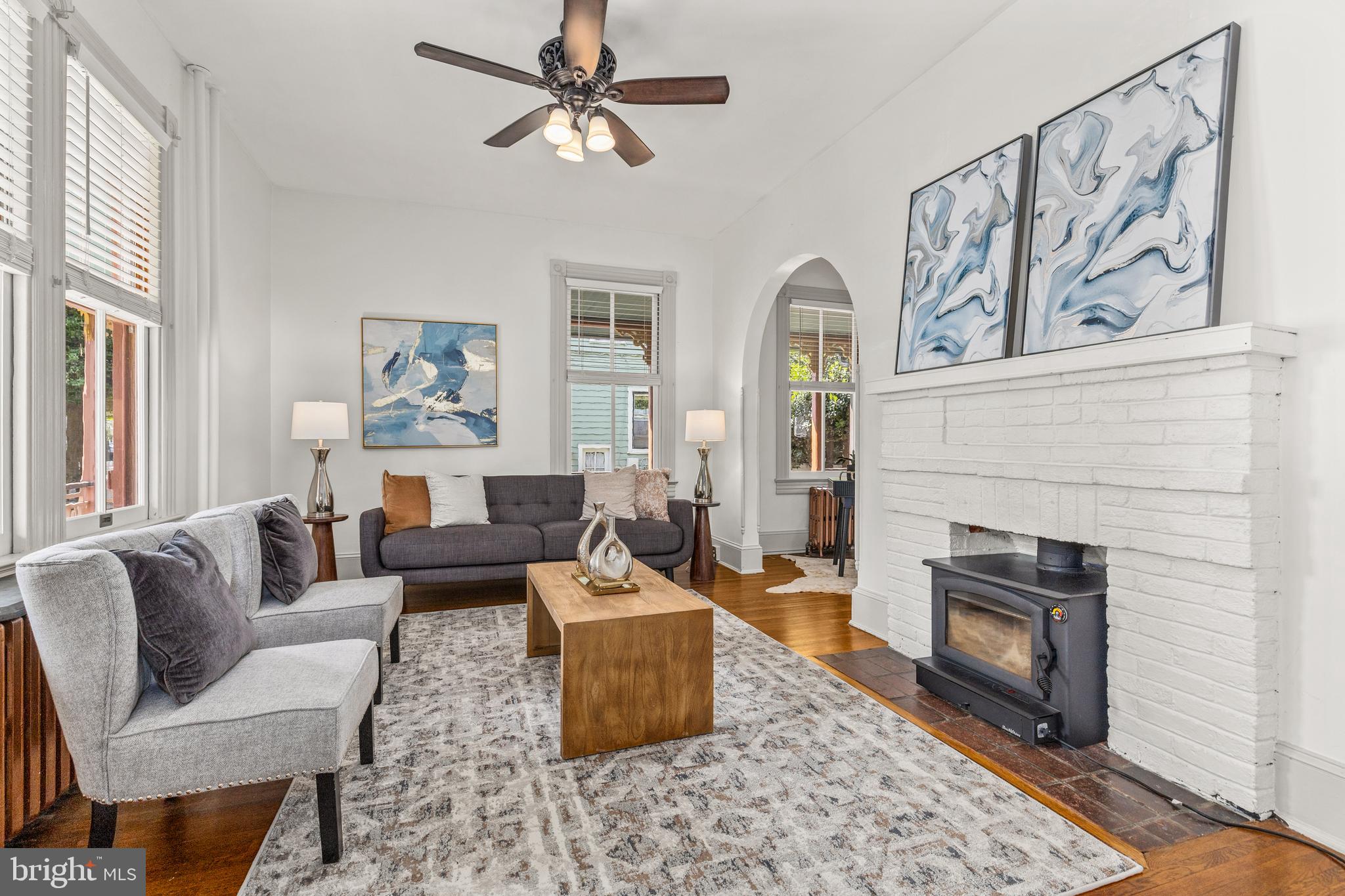 4916 40th Place Hyattsville, MD 20781 - Photo 9 of 48 a living room with furniture and a fireplace