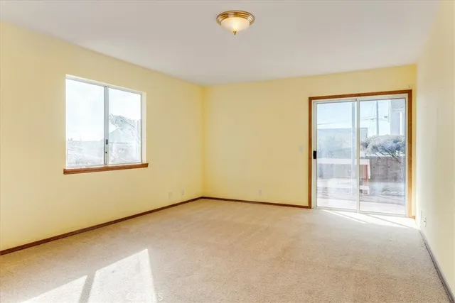 a view of porch with a deck