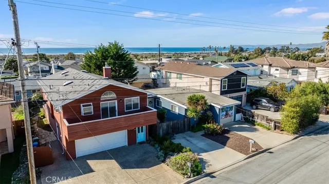 an aerial view of a house with a garden