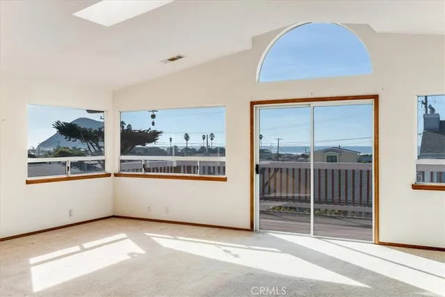 a view of a living room and window