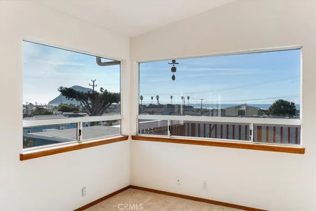 a view of a swimming pool with an outdoor seating