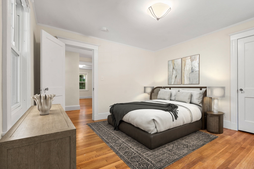 34 Westminster Road Newton, MA 02459 - Photo 11 of 40 a bedroom with bed and a night stand