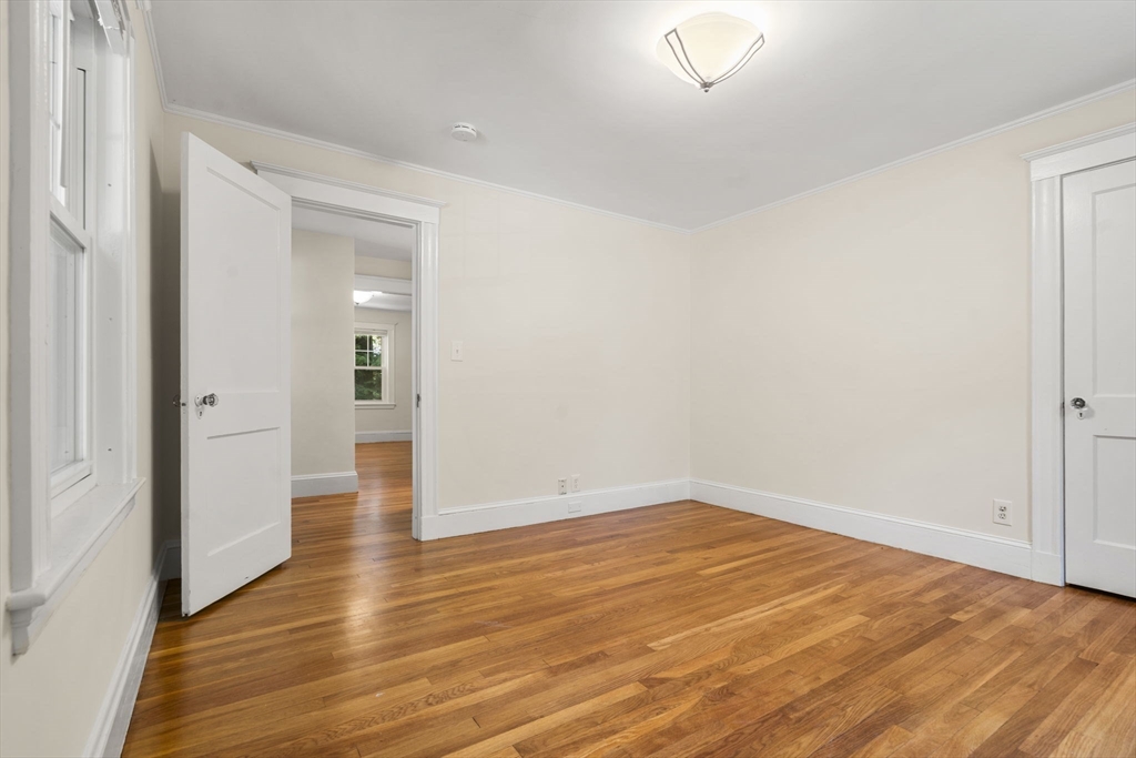 34 Westminster Road Newton, MA 02459 - Photo 12 of 40 a view of empty room with wooden floor