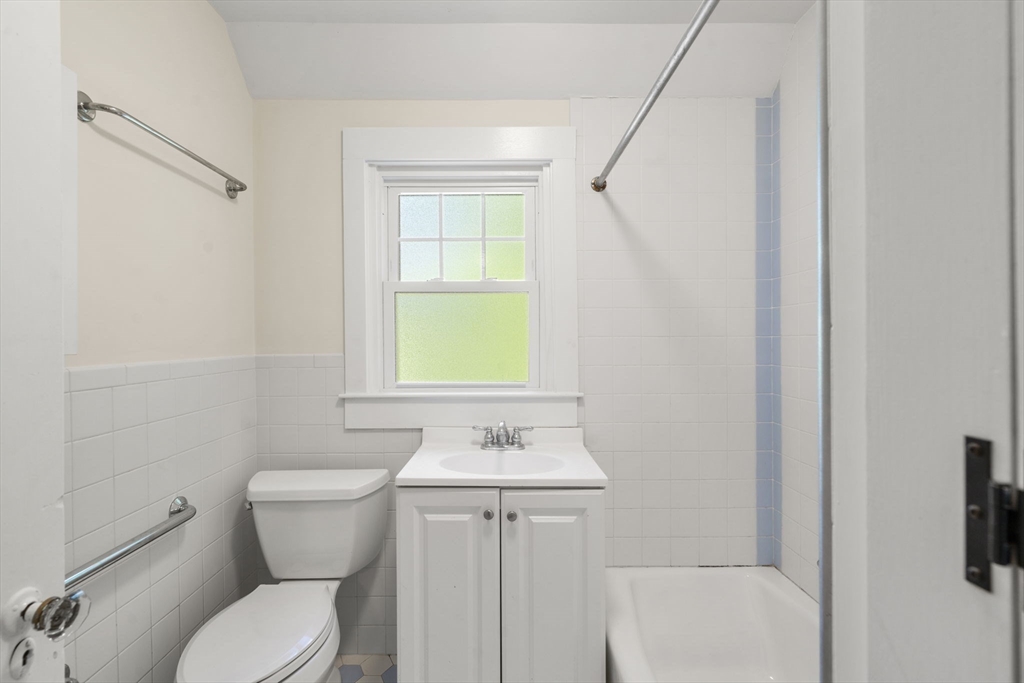 34 Westminster Road Newton, MA 02459 - Photo 15 of 40 a bathroom with a sink toilet and shower