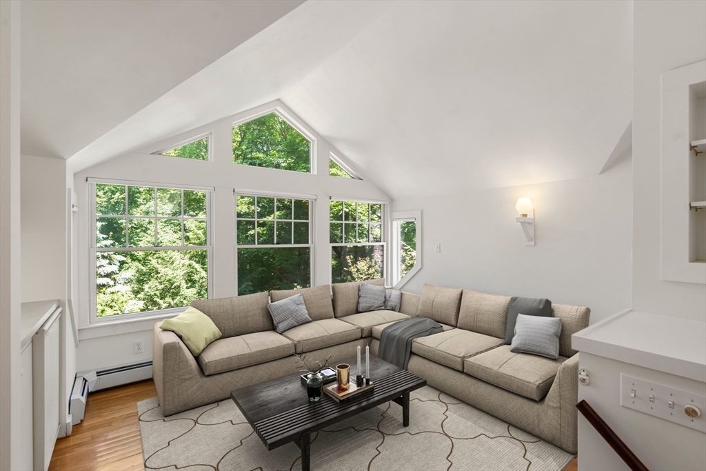 34 Westminster Road Newton, MA 02459 - Photo 19 of 40 a living room with furniture and a large window