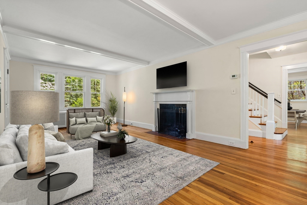 34 Westminster Road Newton, MA 02459 - Photo 2 of 40 a living room with furniture and a fireplace