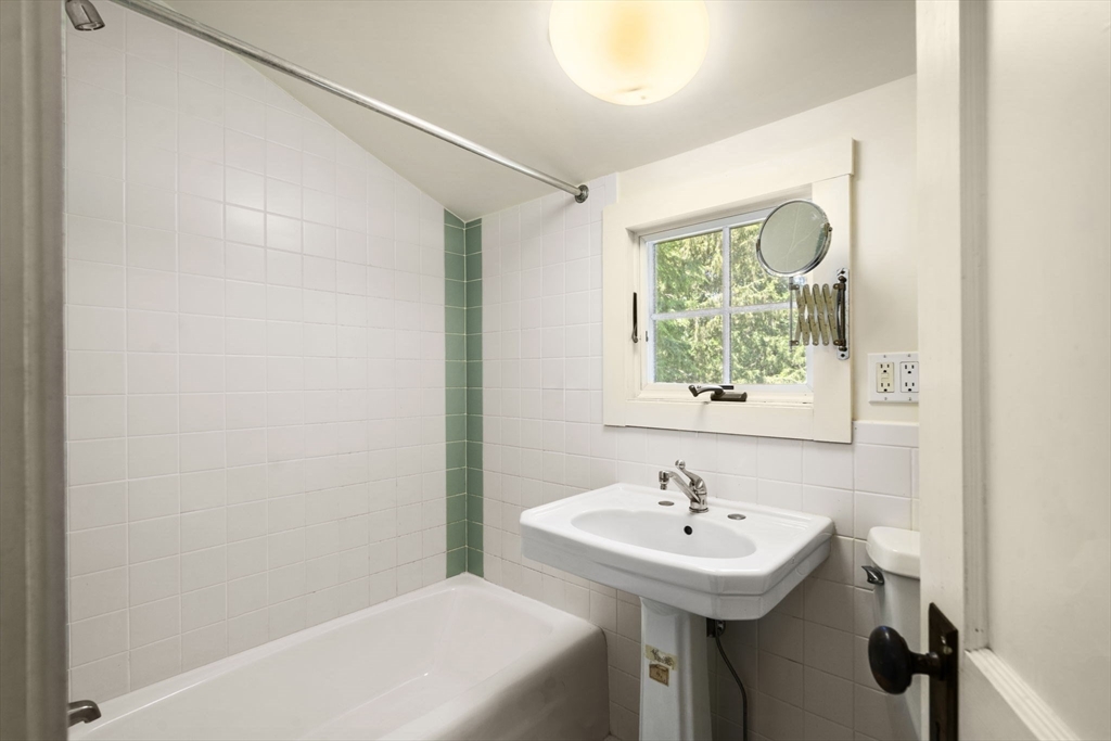 34 Westminster Road Newton, MA 02459 - Photo 25 of 40 a bathroom with a sink and a bathtub