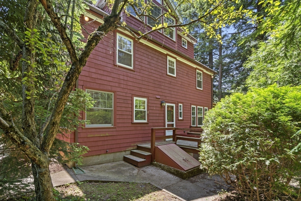 34 Westminster Road Newton, MA 02459 - Photo 26 of 40 a backyard of a house with seating space