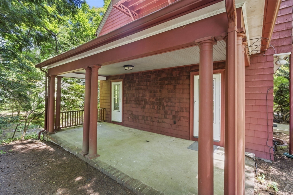 34 Westminster Road Newton, MA 02459 - Photo 28 of 40 a view of a backyard with a large tree