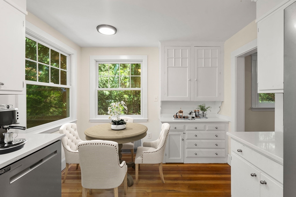 34 Westminster Road Newton, MA 02459 - Photo 7 of 40 a dining room with furniture a window and wooden floor