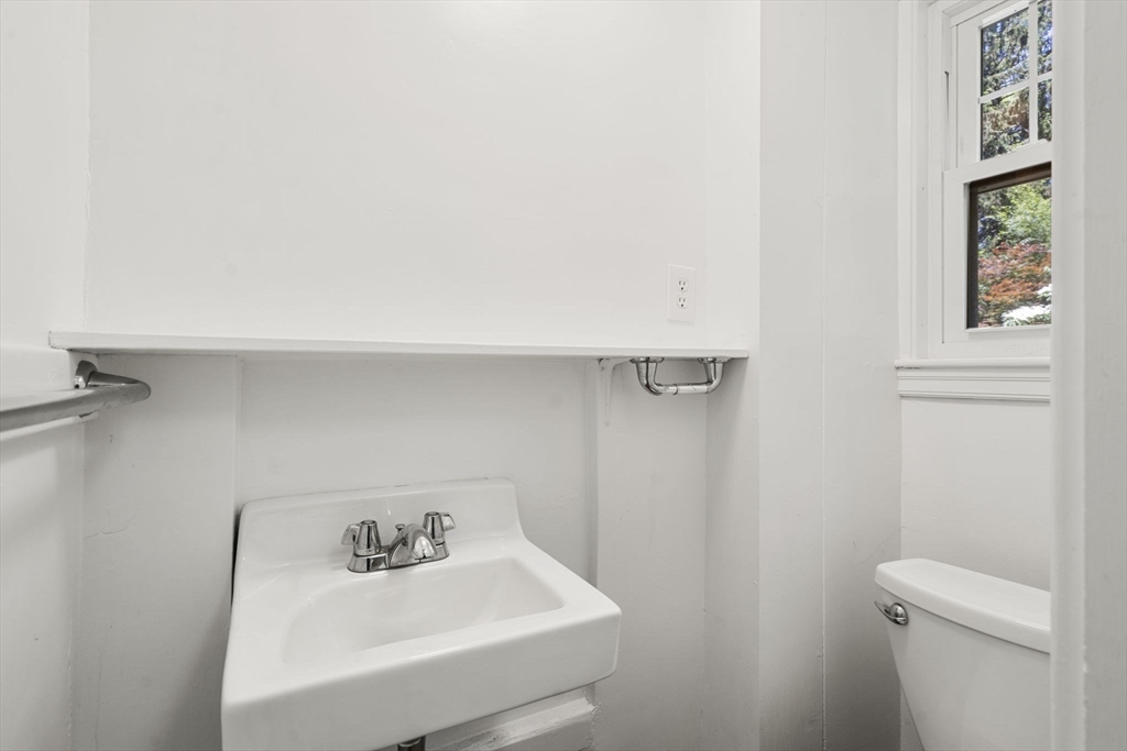 34 Westminster Road Newton, MA 02459 - Photo 10 of 40 a bathroom with a sink and a toilet
