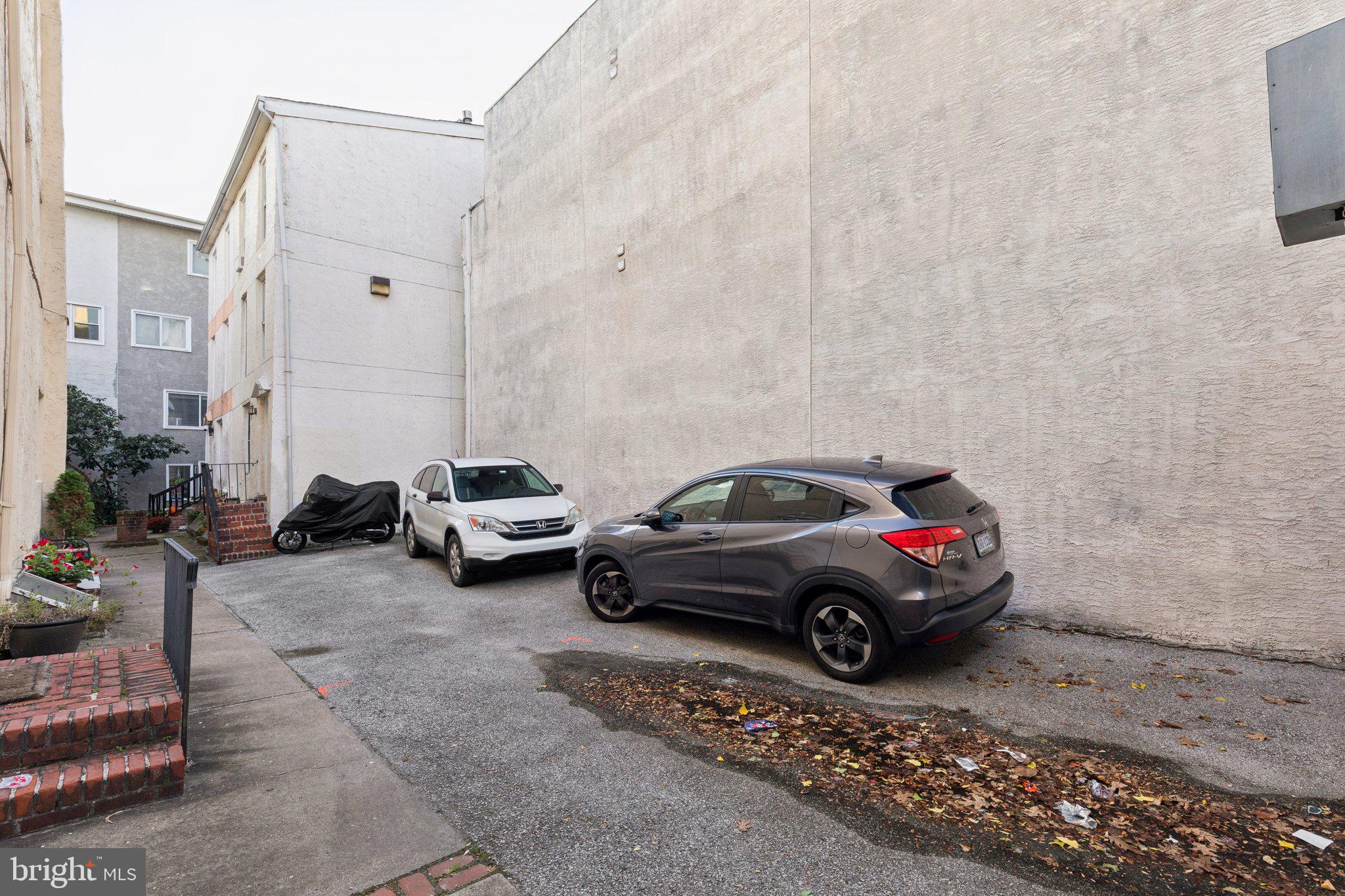 1232 South Street, Unit A Philadelphia, PA 19147 - Photo 25 of 27 a view of cars parked in a parking lot