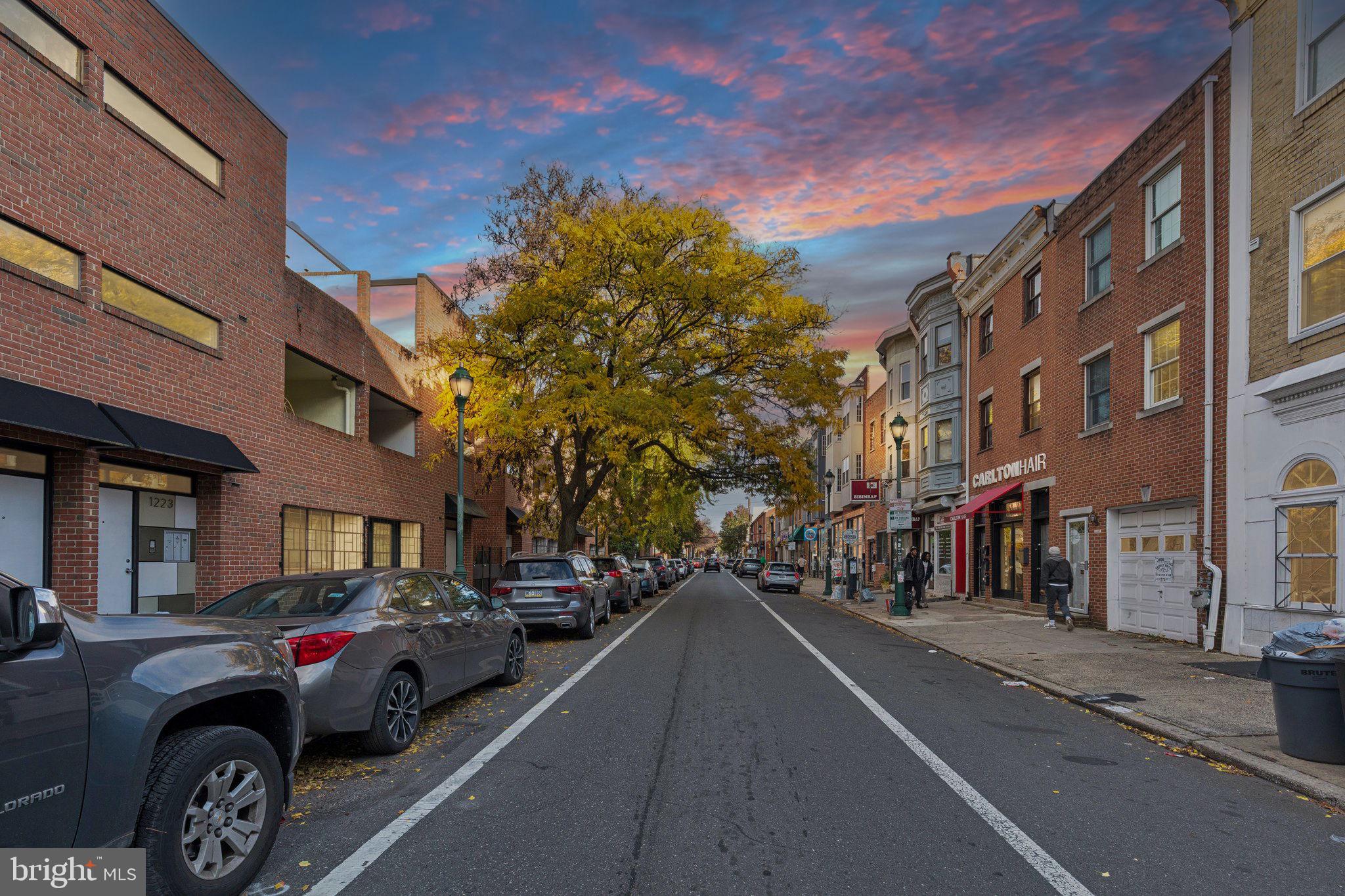 1232 South Street, Unit A Philadelphia, PA 19147 - Photo 26 of 27 a view of a city street both side of a building
