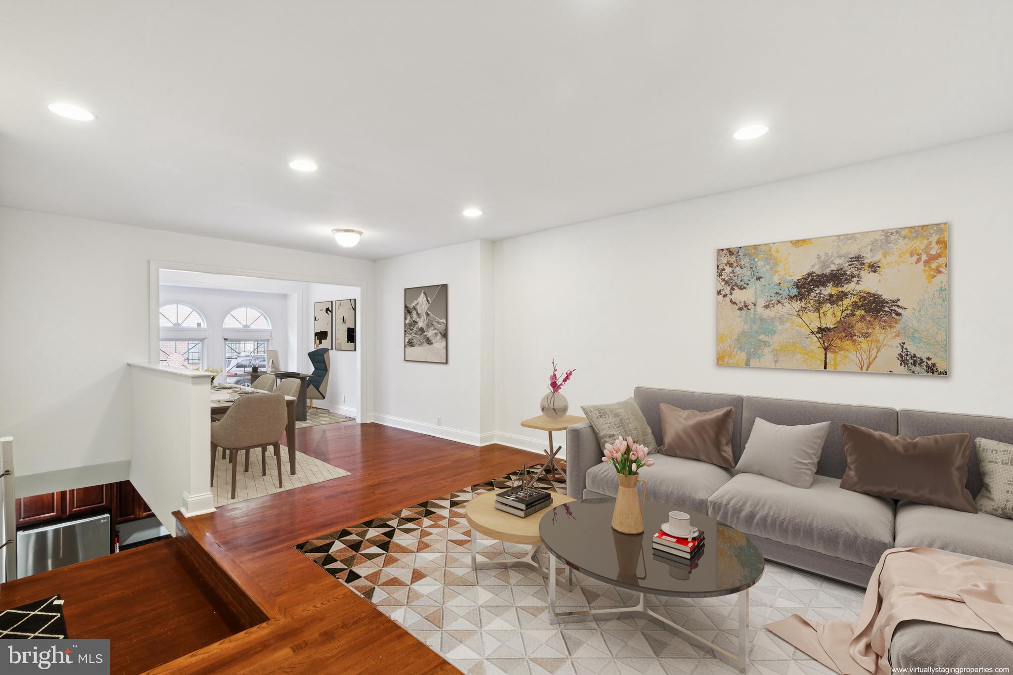 1232 South Street, Unit A Philadelphia, PA 19147 - Photo 3 of 27 a living room with furniture and wooden floor