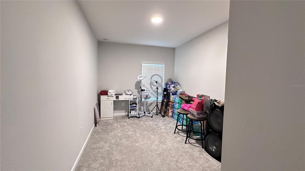 4424 Campsite Loop Orlando, FL 32824 - Photo 23 of 40 a view of room with gym equipment