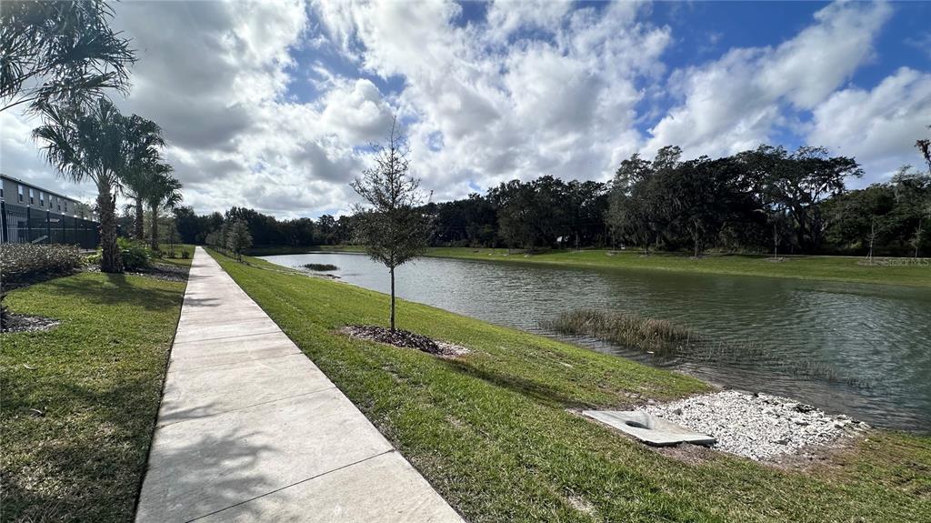 4424 Campsite Loop Orlando, FL 32824 - Photo 28 of 40 a view of a park with large trees