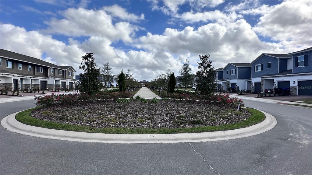 4424 Campsite Loop Orlando, FL 32824 - Photo 33 of 40 a view of the house that has a fountain