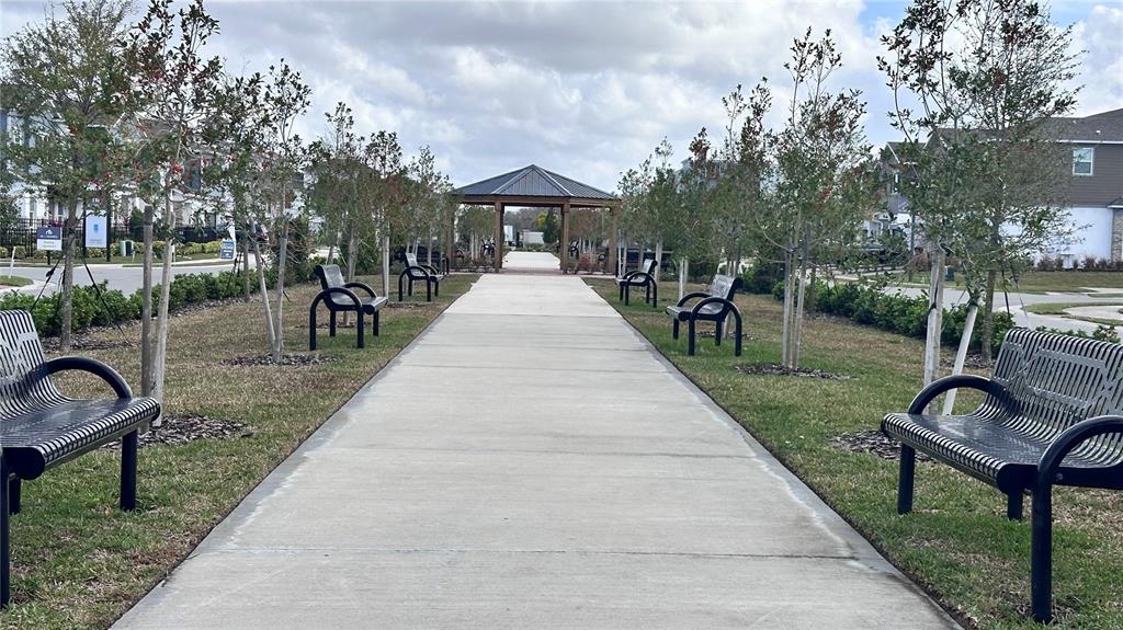 4424 Campsite Loop Orlando, FL 32824 - Photo 34 of 40 a view of a park with furniture and garden