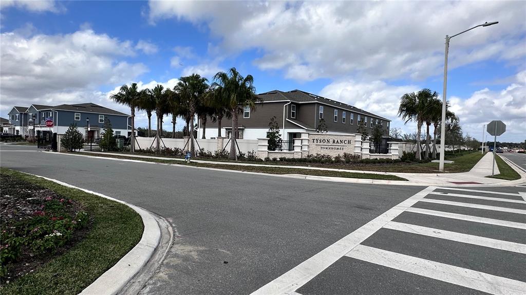 4424 Campsite Loop Orlando, FL 32824 - Photo 40 of 40 a front view of a house with a yard