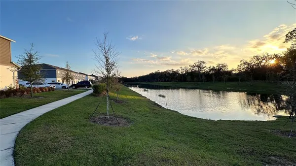a lake view with a garden
