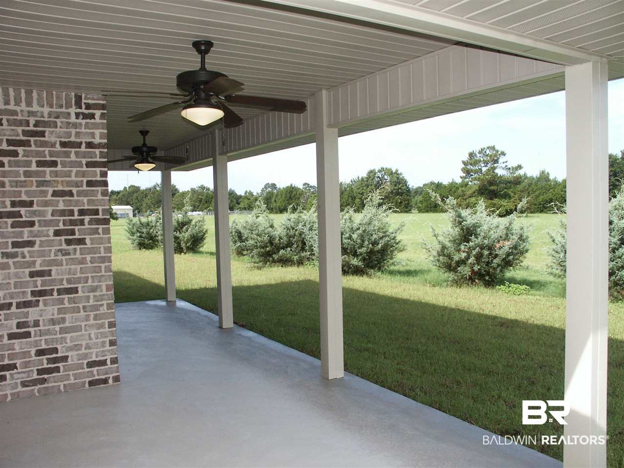 12818 Westfield Loop Lillian, AL 36549 - Photo 14 of 24 Back Porch with Fans