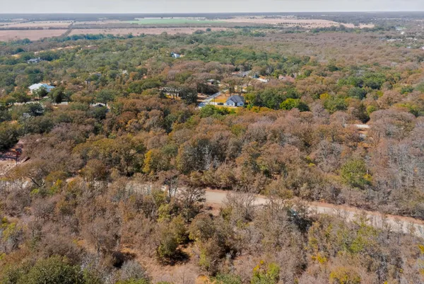 an aerial view of residential house with parking space