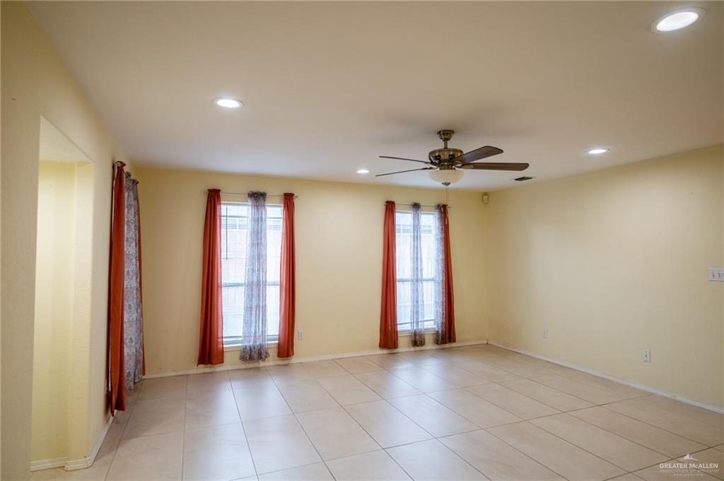 1901 Duke Avenue McAllen, TX 78504 - Photo 17 of 44 Tiled spare room with ceiling fan