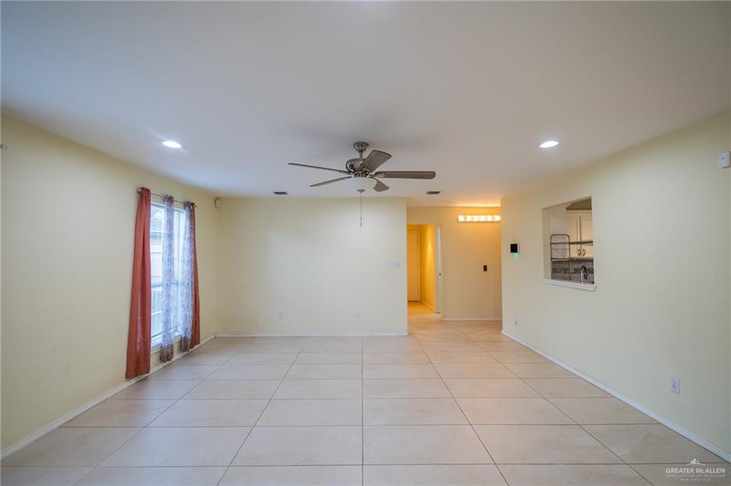 1901 Duke Avenue McAllen, TX 78504 - Photo 18 of 44 Tiled spare room featuring ceiling fan
