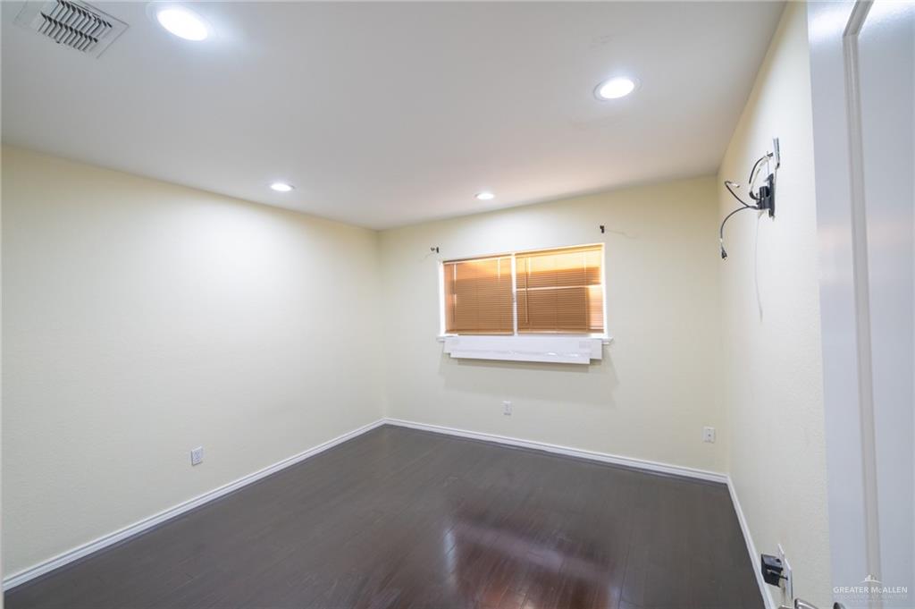 1901 Duke Avenue McAllen, TX 78504 - Photo 31 of 44 Empty room featuring dark hardwood / wood-style flooring