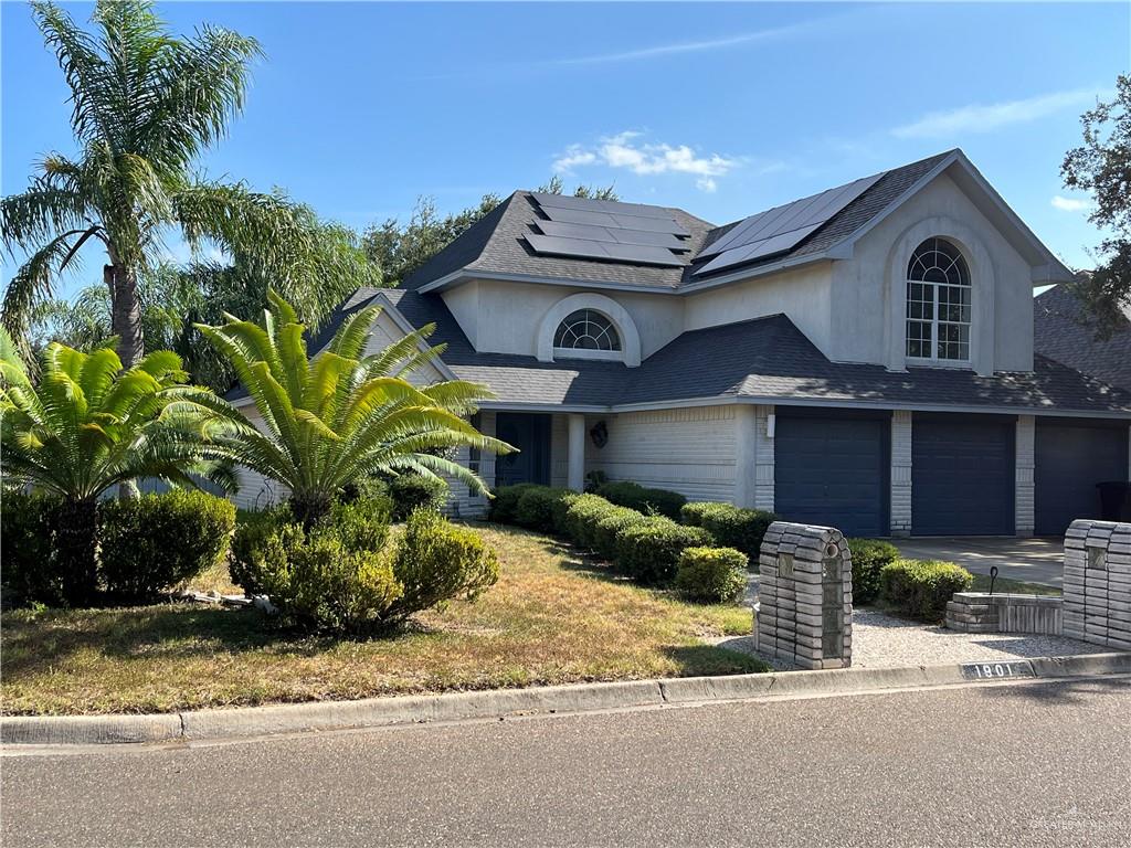 1901 Duke Avenue McAllen, TX 78504 - Photo 44 of 44 View of front of property featuring a garage and solar panels