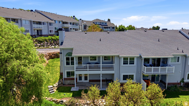 3766 Cardiff Circle Bountiful, UT 84010 - Photo 45 of 46 Rear exterior featuring a two-level design with balconies and patios
