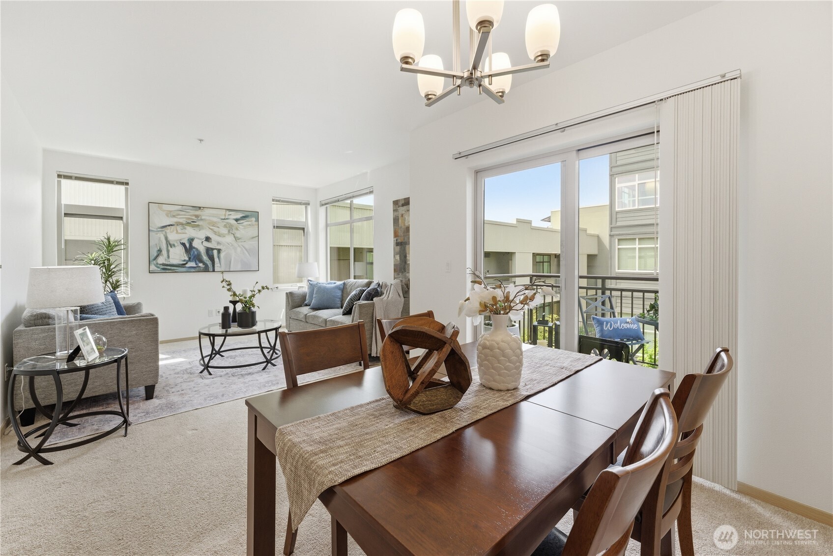 3333 Wallingford Avenue North, Unit 203 Seattle, WA 98103 - Photo 13 of 37 a view of a dining room with furniture window and outside view