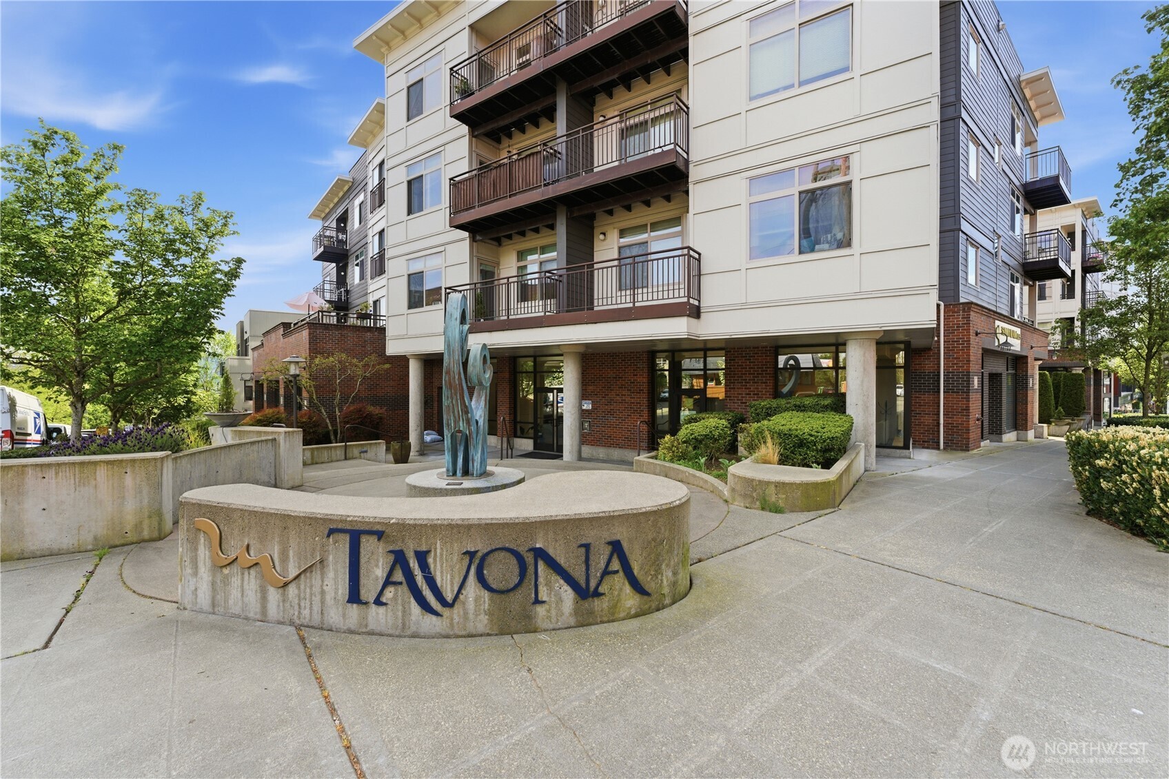 3333 Wallingford Avenue North, Unit 203 Seattle, WA 98103 - Photo 2 of 37 a view of a table and chairs in the patio