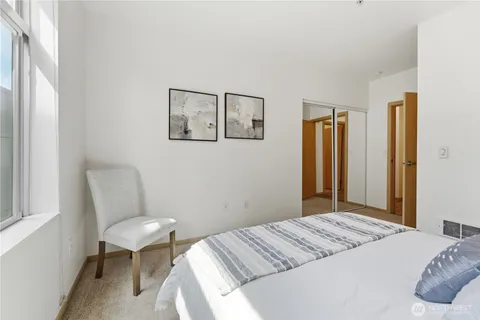 a bedroom with a bed and furniture