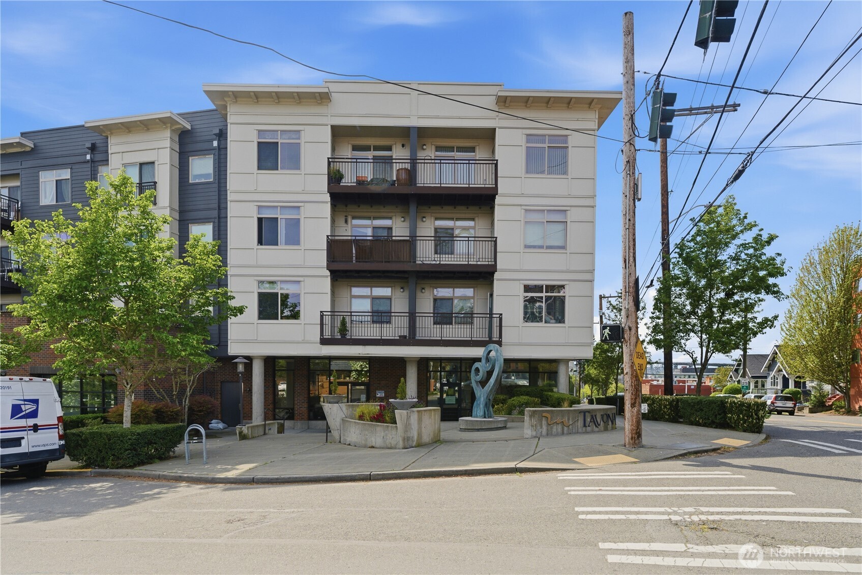 3333 Wallingford Avenue North, Unit 203 Seattle, WA 98103 - Photo 3 of 37 a view of a building and a street view