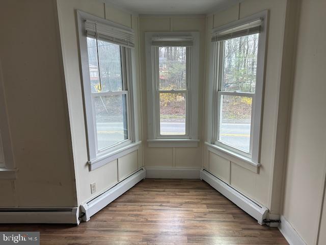519 Twin County Road Honey Brook, PA 19344 - Photo 12 of 14 a view of an empty room with wooden floor and a window