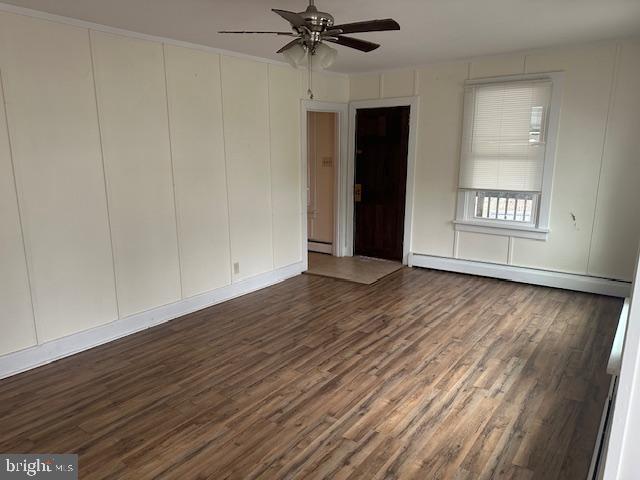 519 Twin County Road Honey Brook, PA 19344 - Photo 14 of 14 a view of an empty room with wooden floor and a window