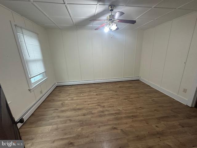519 Twin County Road Honey Brook, PA 19344 - Photo 8 of 14 an empty room with chandelier fan and windows