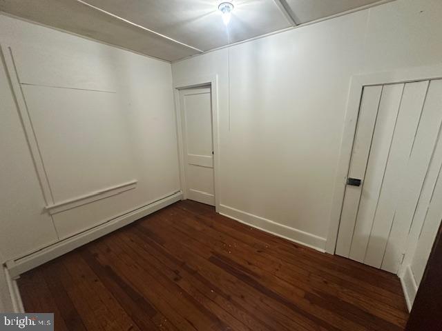 519 Twin County Road Honey Brook, PA 19344 - Photo 9 of 14 a view of an empty room with wooden floor