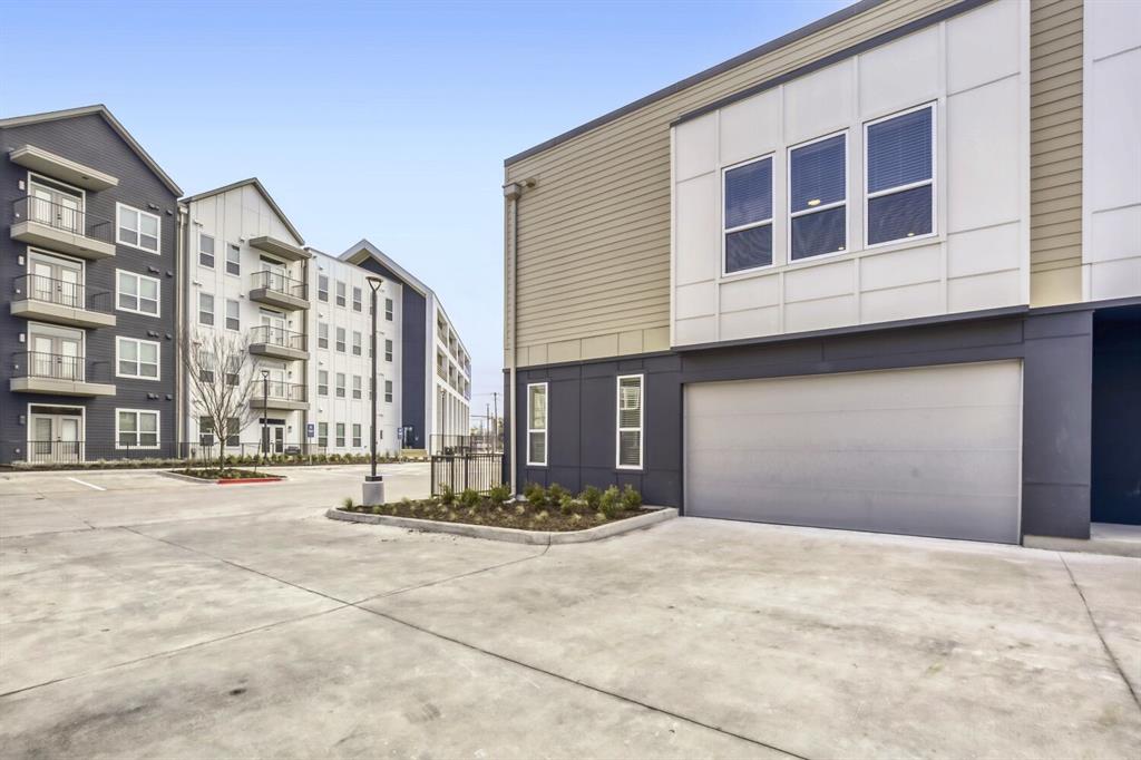10715 Garland Road, Unit 5001 Dallas, TX 75218 - Photo 6 of 11 a view of a building with a street