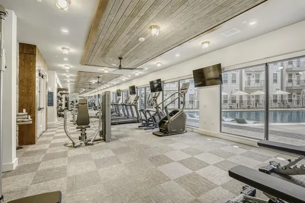 a view of a room with gym equipment