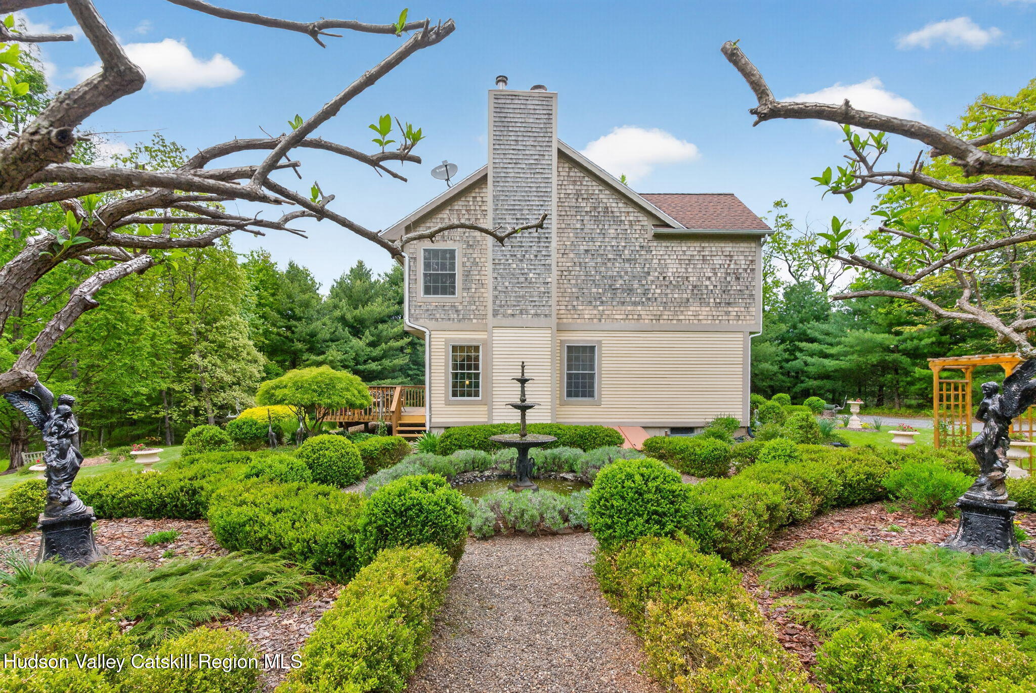 189 Bush Road Stone Ridge, NY 12484 - Photo 38 of 60 a house with lots of trees