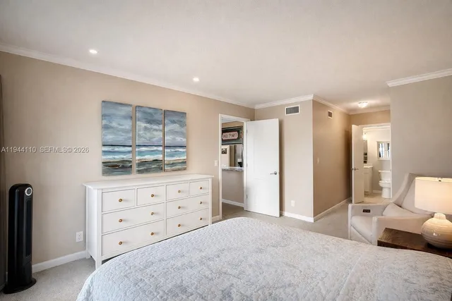 a bedroom with a bed and furniture