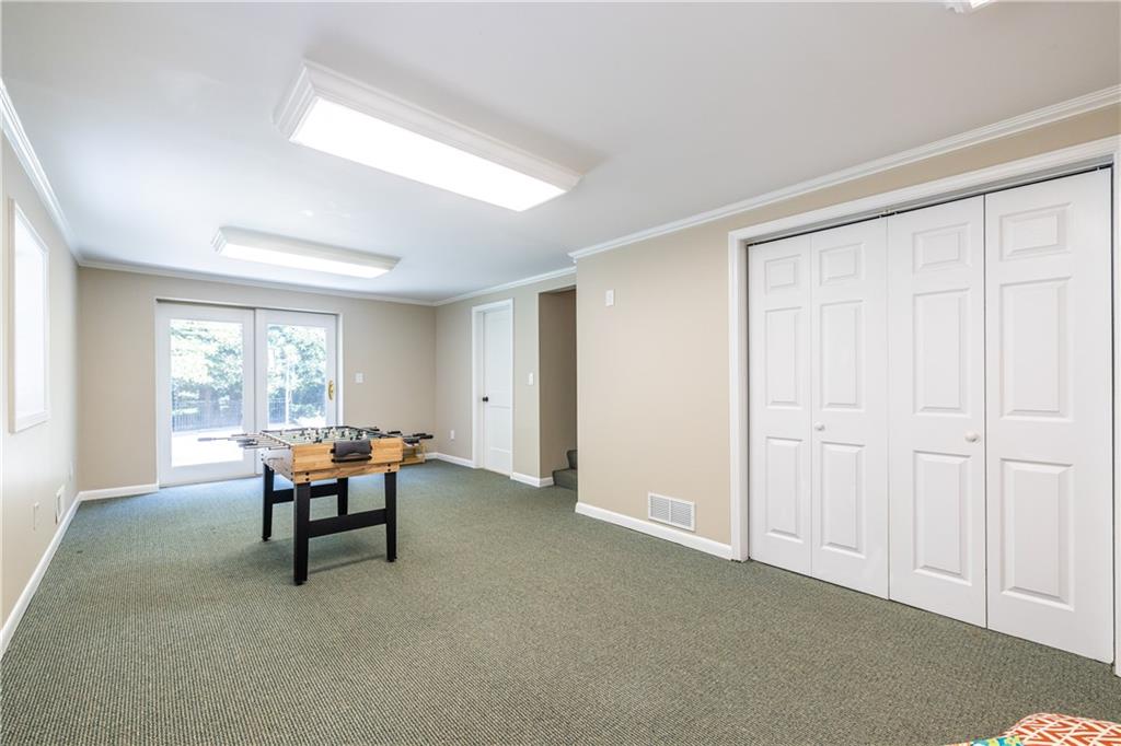 1890 Silvastone Drive Decatur, GA 30033 - Photo 31 of 48 a view of a livingroom with furniture and a window