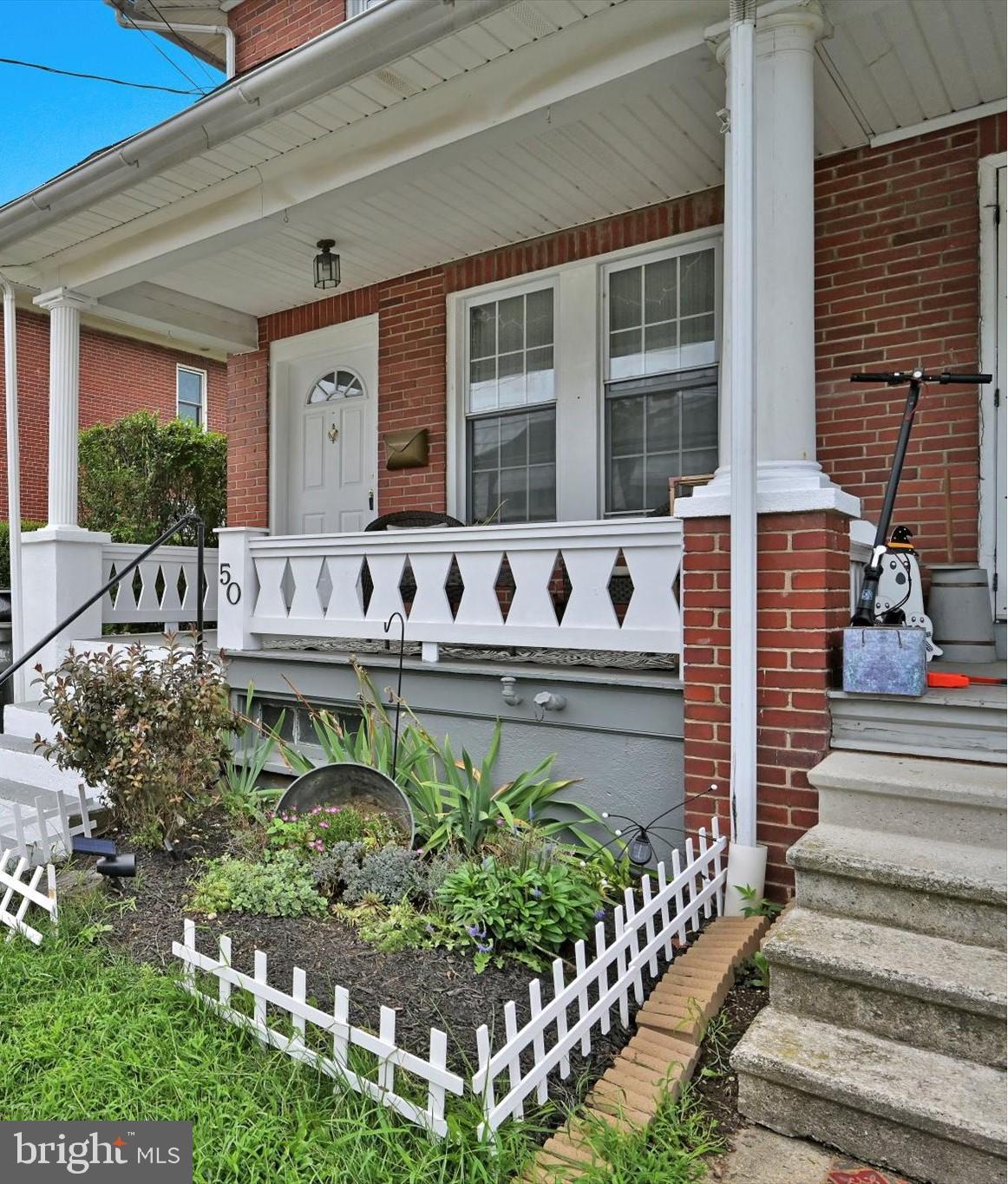50 Cacoosing Avenue Sinking Spring, PA 19608 - Photo 4 of 26 a front view of a house with street chairs