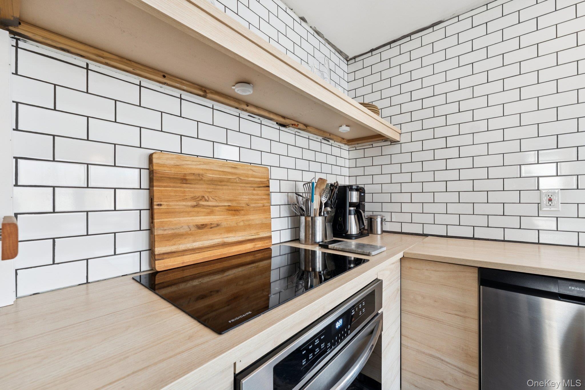 176 Maple Avenue South Flanders, NY 11901 - Photo 15 of 40 a kitchen with a sink and cabinets